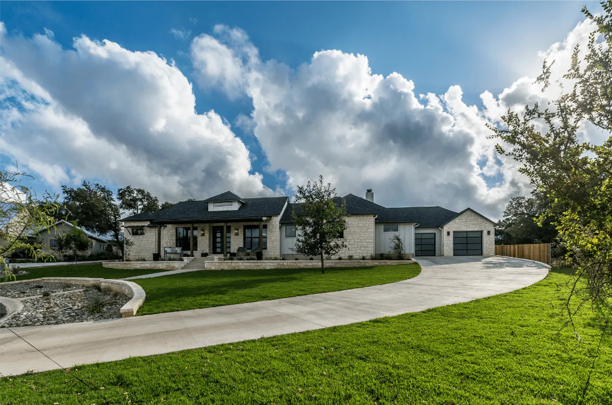 Seamless gutter and guard work on a custom estate in The Uplands, Bee Cave TX