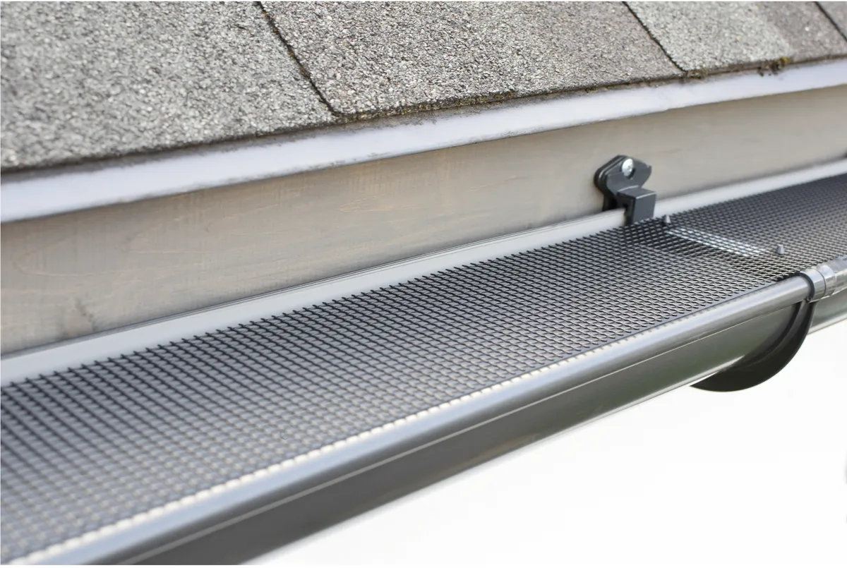 Close-up of a micro-mesh gutter guard installed on a Central Texas home